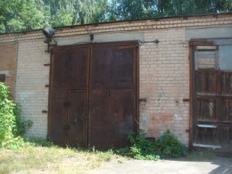 Помещение (гараж) 130,6 кв.м. в Курской области, г. Дмитриев, ул. Рабочая, д. 10, пом. III